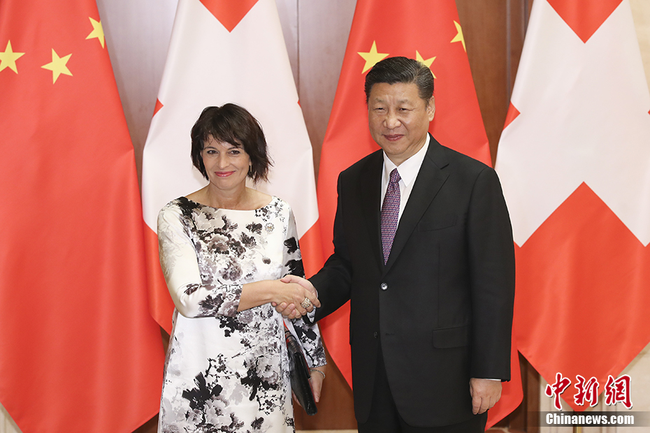 Chinese President Xi Jinping(R) meets with Swiss President Doris Leuthard(L) in Beijing, May 13, 2017. [Photo: Chinanews.com]