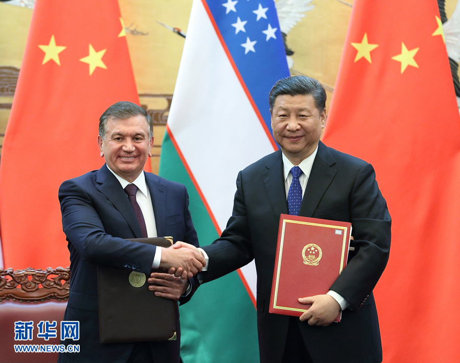 Chinese President Xi Jinping on Friday called for expanding cooperation with Uzbekistan to achieve new progress in carrying out the Belt and Road Initiative. [Photo: xinhua]