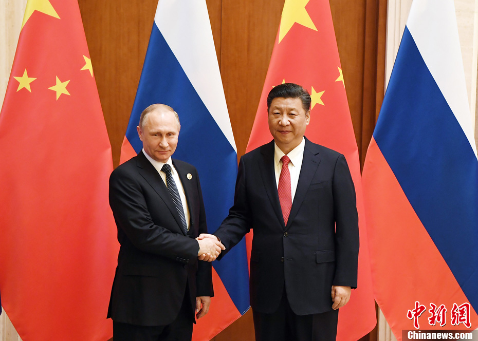 Chinese President Xi Jinping(R) meets with Russian President Vladimir Putin(L) in Beijing, May 14, 2017. [Photo: Chinanews.com] 