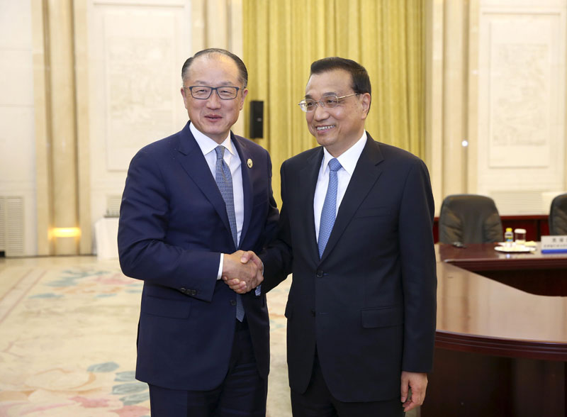 Chinese Premier Li Keqiang meets with World Bank President Jim Yong Kim, who is here for the Belt and Road Forum (BRF) for International Cooperation, at the Great Hall of the People in Beijing, capital of China, May 14, 2017. [Photo: China News Service]