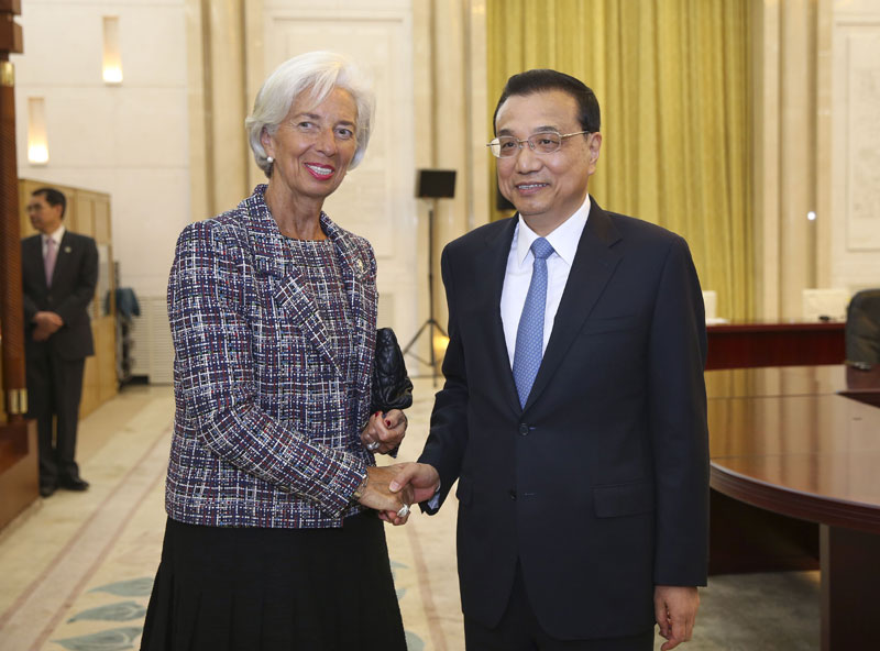 Chinese Premier Li Keqiang meets with Managing Director of the International Monetary Fund (IMF) Christine Lagarde, who is here for the Belt and Road Forum (BRF) for International Cooperation, at the Great Hall of the People in Beijing, capital of China, May 14, 2017. [Photo: China News Service]