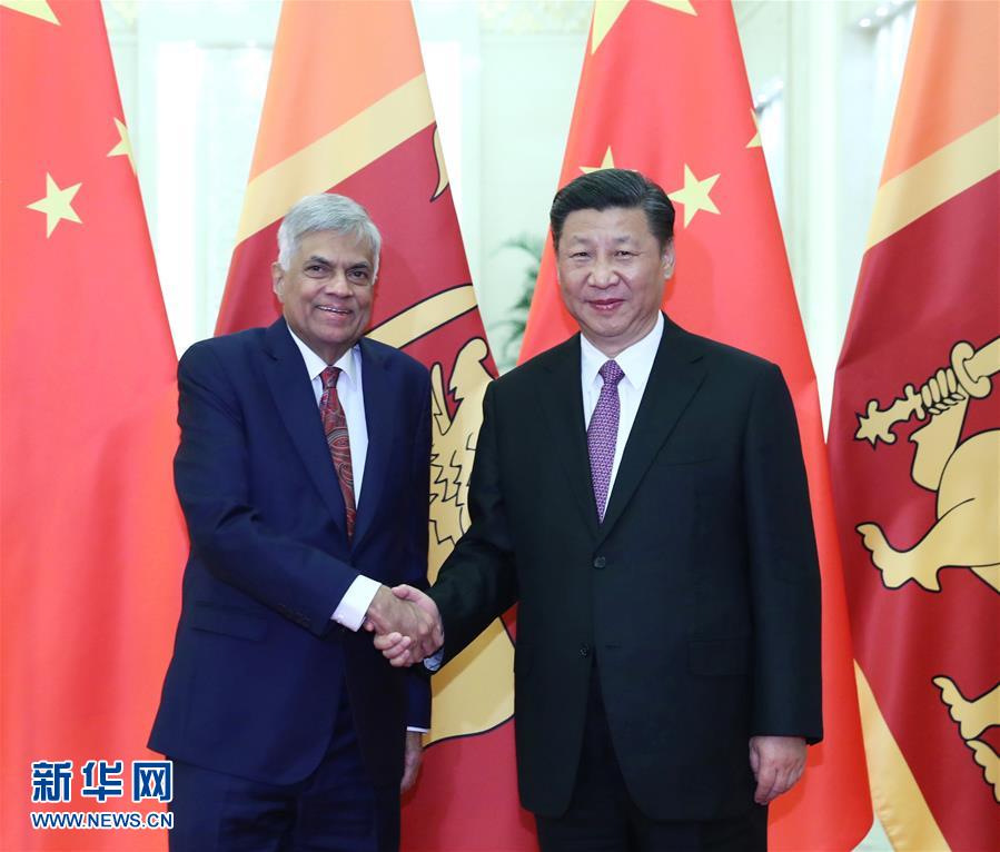 Chinese President Xi Jinping meets with Sri Lankan Prime Minister Ranil Wickremesinghe after the two-day Belt and Road Forum for International Cooperation in Beijing, capital of China, May 16, 2017. [Photo: Xinhua]