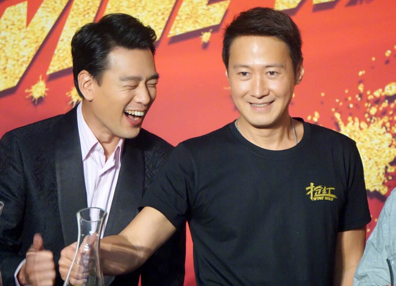 Taiwan actor David Wang (left) and Leon Lai Ming (right) attend a promotional news conference in Beijing for their upcoming film "Wine War" in Beijing on Sunday, May 14, 2017. [Photo: China Plus]