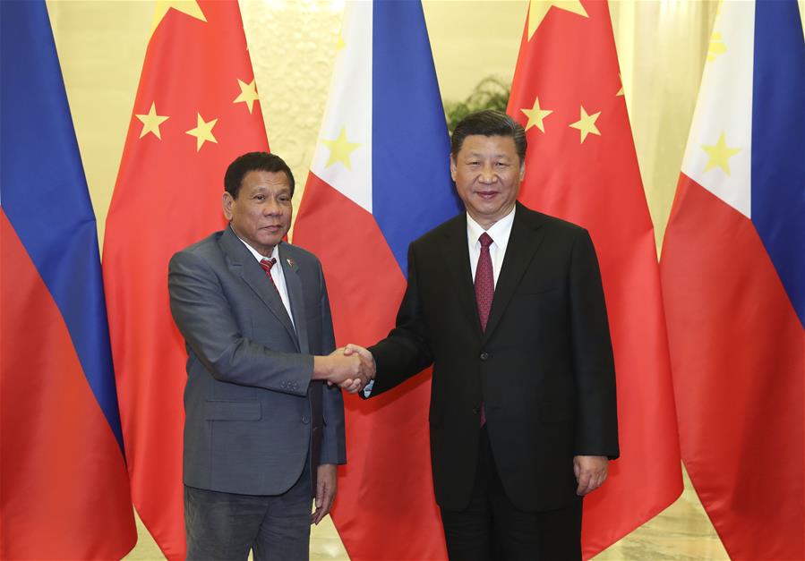 Chinese President Xi Jinping (R) meets with Philippine President Rodrigo Duterte, who is here for the Belt and Road Forum (BRF) for International Cooperation, at the Great Hall of the People in Beijing, capital of China, May 15, 2017. [Photo: Xinhua]