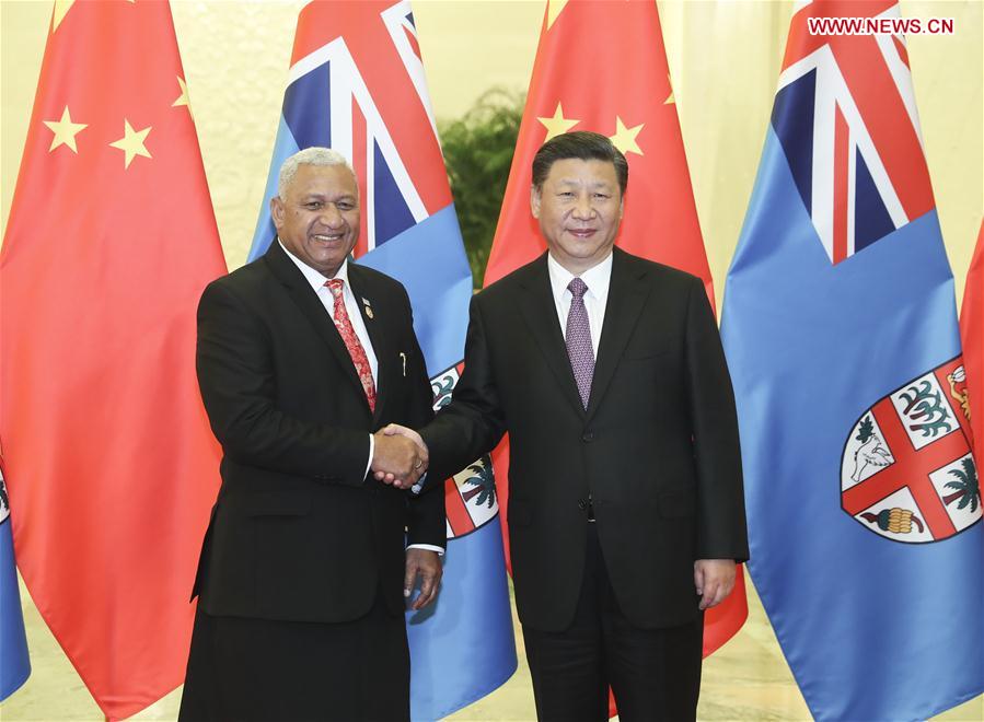 Chinese President Xi Jinping meets with Fijian Prime Minister Josaia Voreqe Bainimarama after the two-day Belt and Road Forum for International Cooperation in Beijing, capital of China, May 16, 2017.[Photo: Xinhua]