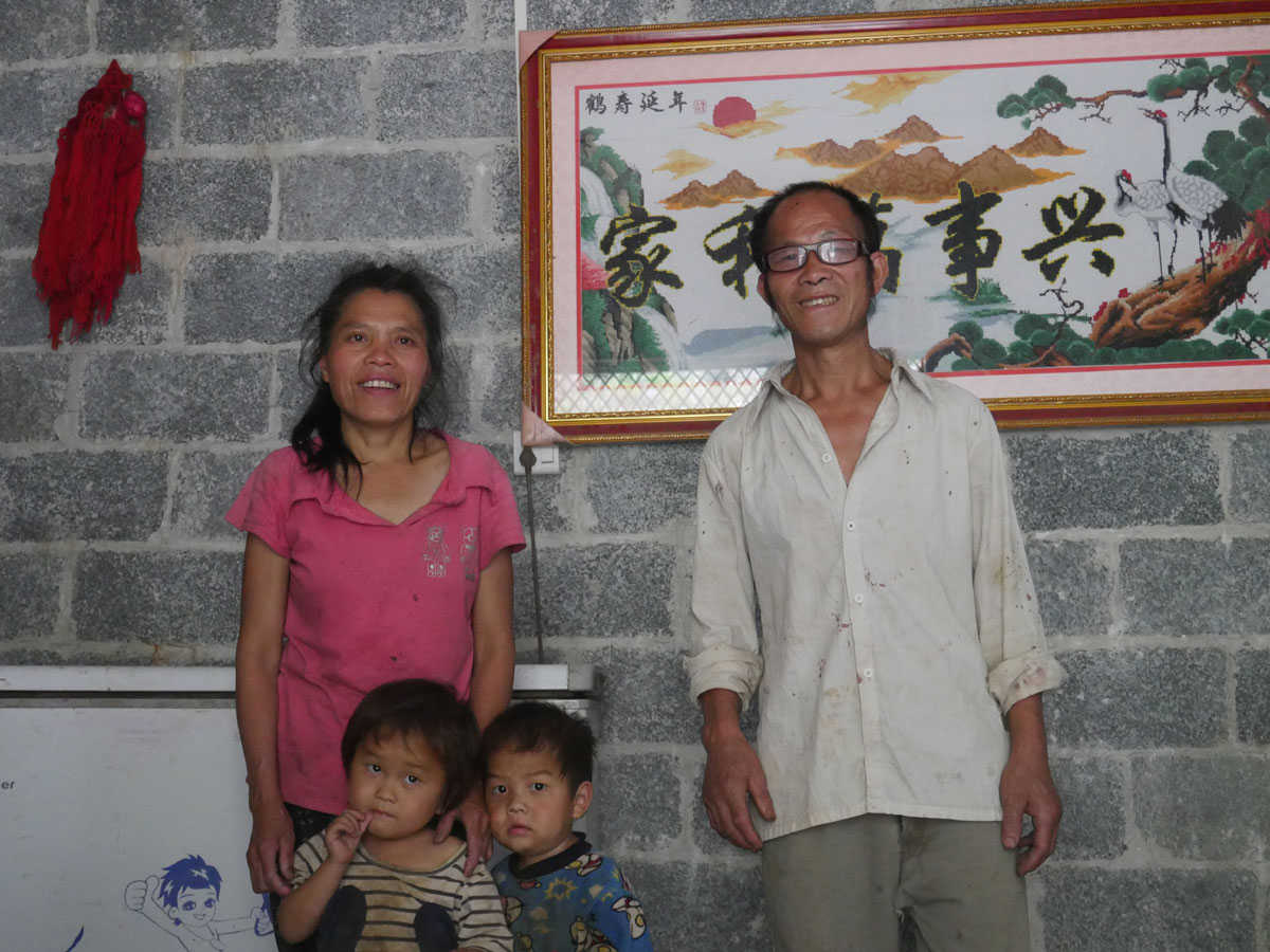 Lan Yueying and her family in the new house.[Photo:China Plus/Wang Xin]