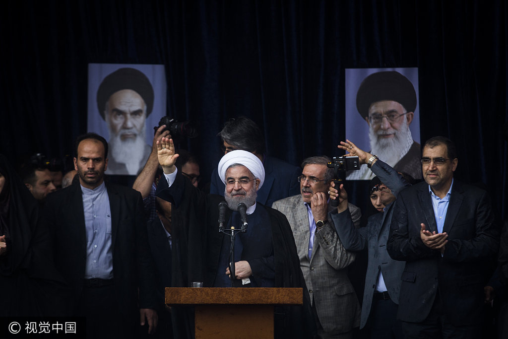 Iranian President Hassan Rouhani addresses a mass of supporters during a campaign rally organized prior to presidential elections that will be held on May 19. Iran's presidential election is a choice between moderate incumbent Rouhani and hardline jurist Ebrahim Raisi. [Photo: Nazanin Tabatabaee Yazdi/Polaris]