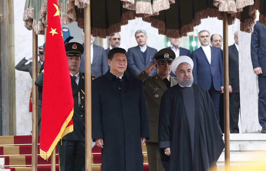Chinese President Xi Jinping (L front) attends a grand welcome ceremony before talks with Iranian President Hassan Rouhani (R front) in Tehran, Iran, Jan. 23, 2016. [Photo: Xinhua/Ju Peng]