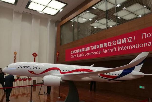 A model of a jetliner is displayed at the launch ceremony of the China-Russia Commercial Aircraft International Corporation Limited in Shanghai on May 22, 2017. CRAIC is a joint venture between the Commercial Aircraft Corporation of China (COMAC) and United Aircraft Corporation (UAC) of Russia. [Photo: sina.com.cn]