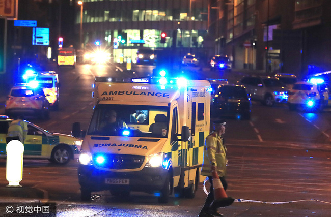 Emergency services at Manchester Arena after reports of an explosion at the venue during an Ariana Grande gig. [Photo: VCG/Peter Byrne]