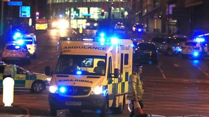 Emergency services at Manchester Arena after reports of an explosion at the venue during an Ariana Grande gig. [Photo: VCG/Peter Byrne]