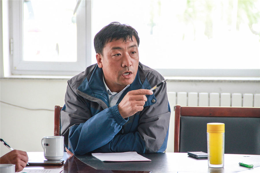 A picture of Pang Xuewen, the Party Secretary of Liangzhongchang Village. [Photo: China Plus]