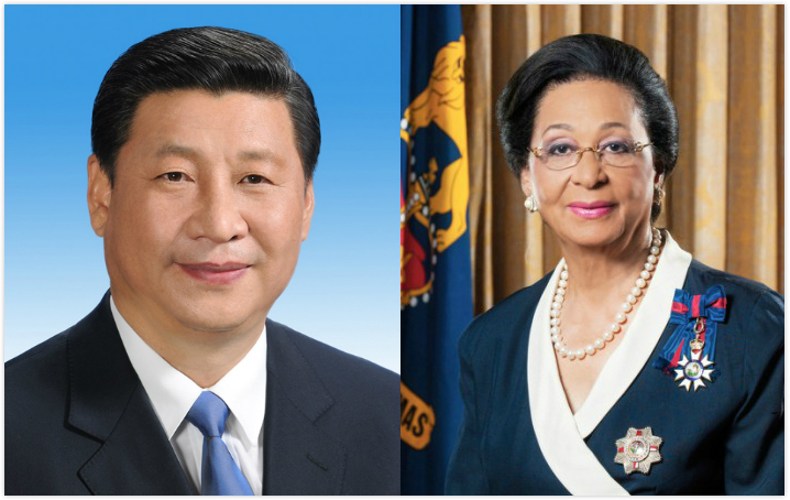 Chinese President Xi Jinping(L) exchanges congratulations with Marguerite Pindling(R), governor-general of the Commonwealth of the Bahamas, on the 20th anniversary of the establishment of diplomatic relations between the two countries, May 23, 2017. [File Photo: China Plus]