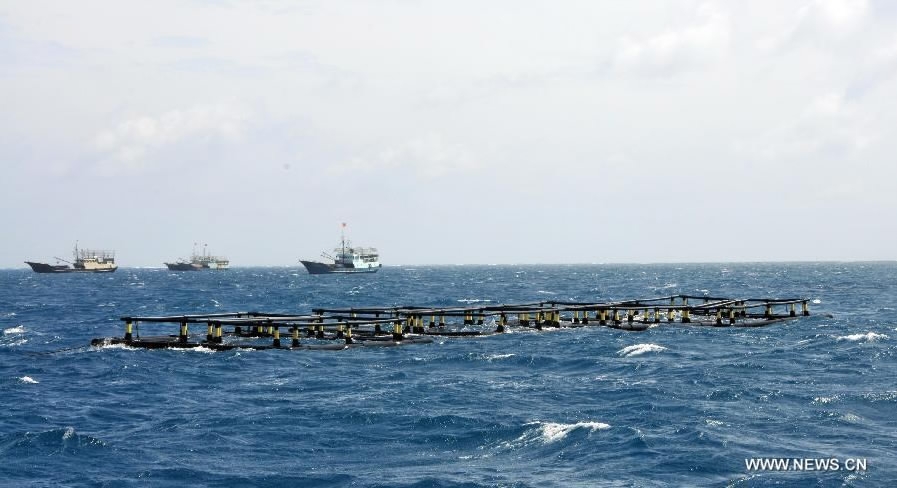 A fish farm is seen in the waters at Meiji Reef of the South China Sea. [Photo: Xinhua]
