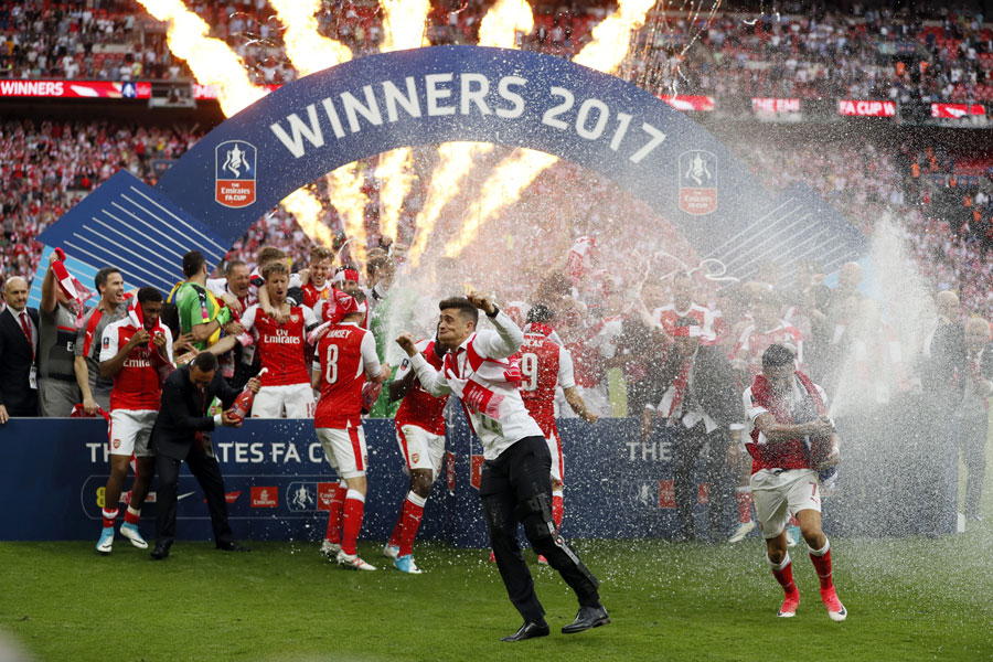 Arsenal's players celebrate winning the English FA Cup final soccer match between Arsenal and Chelsea at the Wembley stadium in London, Saturday, May 27, 2017. [Photo/Matt Dunham]