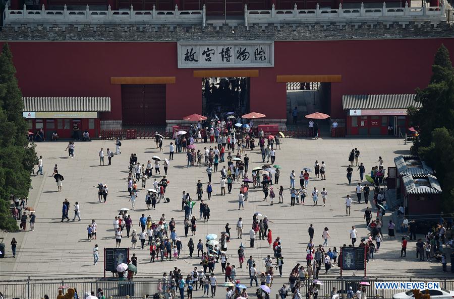 Tourists visit the Palace Museum in Beijing, capitial of China, May 30, 2017, the last day of China's Dragon Boat Festival holiday. [Photo: Xinhua]