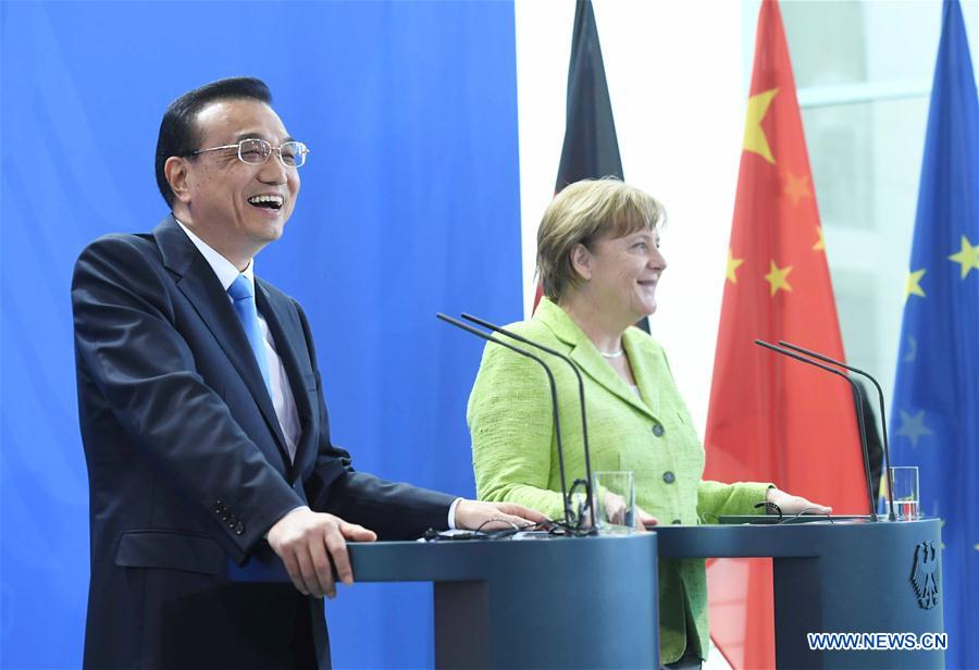 Chinese Premier Li Keqiang and his German counterpart Angela Merkel meet reporters at a joint press conference in Berlin, Germany, June 1, 2017. [Photo: Xinhua/Zhang Duo]
