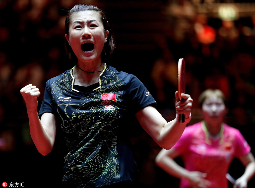 Ning Ding of China in celebrates winning against Yuling Zhu of China during the Women's final match at the World Table Tennis Championships in Duesseldorf, Germany, 04 June 2017. [Photo: Imagine China]