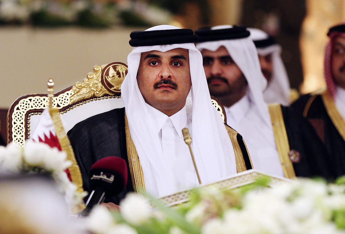 Qatar's Emir Sheikh Tamim bin Hamad Al-Thani attends a Gulf Cooperation Council summit in Doha, Qatar, Dec. 9, 2014. [File Photo: AP/Osama Faisal]