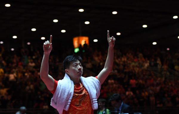 Ma Long celebrates after winning the men's singles title at the World Championships in Dusseldor, Germany on June 5, 2017. [Photo: Xinhua]