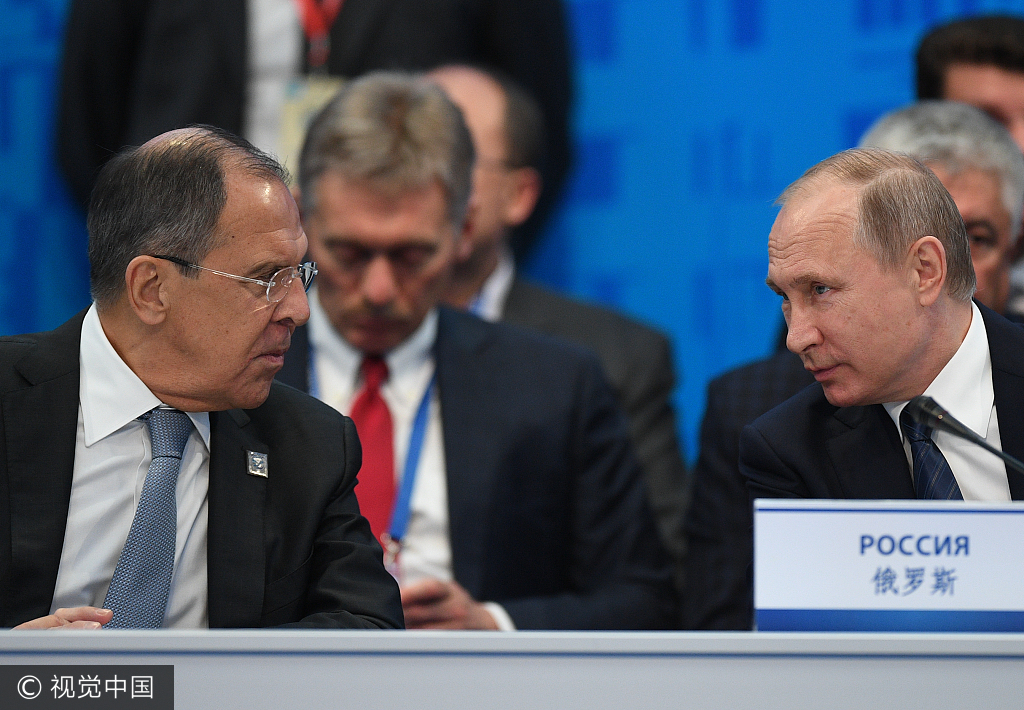 Russian President Vladimir Putin at the expanded format meeting of the Council of Heads of State of the Shanghai Cooperation Organization (SCO) with Russian Foreign Minister Sergei Lavrov. [Photo: Sputnik/Vladimir Astapkovich]