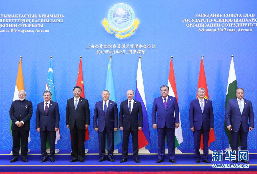 From left, Indian Prime Minister Narendra Modi, Uzbek President Shavkat Mirziyoyev, Chinese President Xi Jinping, Kazakh President Nursultan Nazarbayev, Russian President Vladimir Putin, Tajik President Emomali Rakhmon, Kyrgyz President Almazbek Atambayev, Pakistani Prime Minister Nawaz Sharif pose for a photo at a summit of the Shanghai Cooperation Organization in Astana, Kazakstan, Friday, June 9, 2017. [Photo: Xinhua]