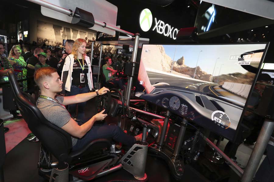 E3 2017 attendees get their hands on "Forza Motorsport 7" at the Xbox booth at E3 2017 in Los Angeles on Tuesday, June 13, 2017. [Photo: AP]