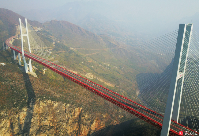 Aerial view of the Beipanjiang Bridge, the world's highest bridge, over the Nizhu River Canyon on the boundary of southwest China's Guizhou and Yunnan provinces, 28 December 2016. [Photo:dfic]