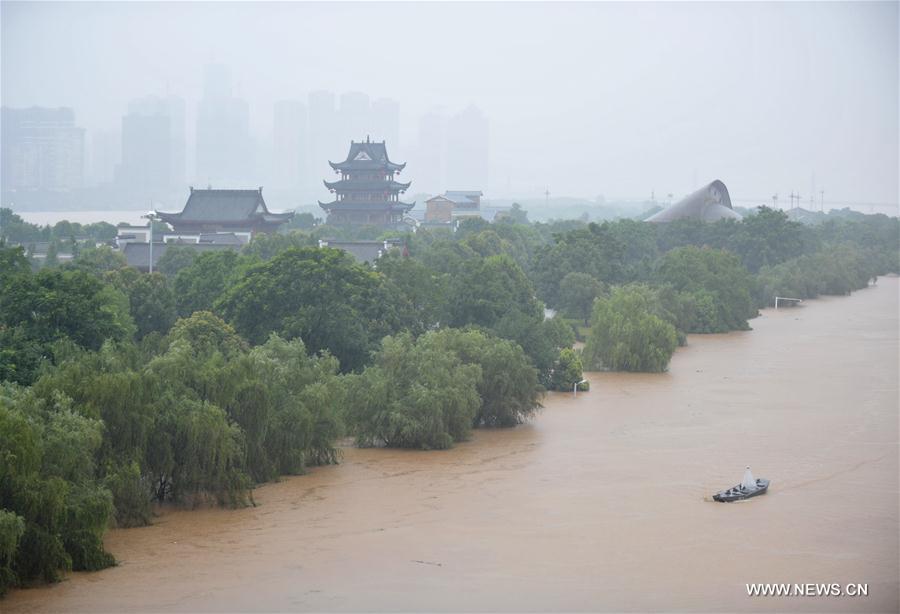 Photo taken on July 1, 2017 shows the flooded area in Changsha, capital of central China's Hunan Province. At 11 a.m. Saturday, the water level of Xiangjiang River, a major river in the province, rose up to 38.37 meters at Changsha hydrological station, 2.37 meters above the alarm level. [Photo: Xinhua]
