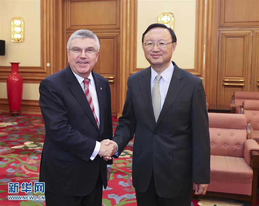 Chinese State Councilor Yang Jiechi meets with IOC President Thomas Bach in Beijing on Sunday, July 2nd. [Photo: Xinhua]