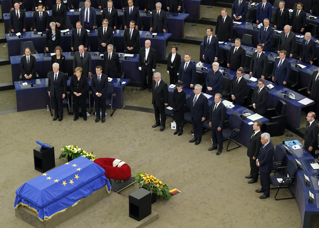 Leaders stand at attention during an homage ceremony to former German Chancellor Helmut Kohl, at the European Parliament in Strasbourg, eastern France, Saturday July 1, 2017. Current and former world leaders gathered Saturday to bid farewell to former German Chancellor Helmut Kohl, recalling him as a man who was instrumental in uniting Europe and bringing about reconciliation between former adversaries on the continent. [Photo: AP/Michel Euler]