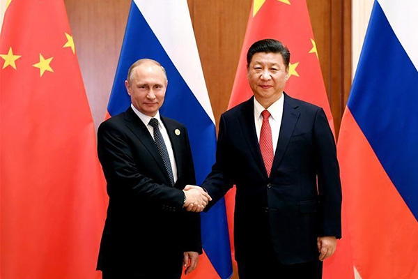 President Xi Jinping (R) meets with Russian President Vladimir Putin, who is in Beijing for the Belt and Road Forum (BRF) for International Cooperation, at the Diaoyutai State Guesthouse in Beijing, May 14, 2017. [Photo: Xinhua]