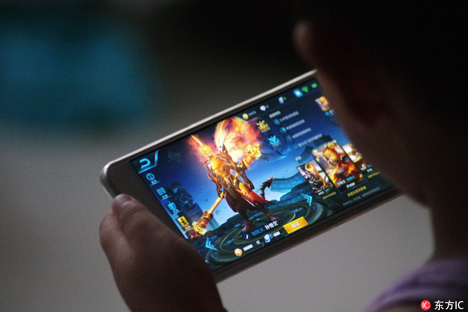 China's megahit mobile game "Honor of Kings" faces a domestic backlash over young players' addiction, but its march to the global market goes on unabated. [Photo: IC]