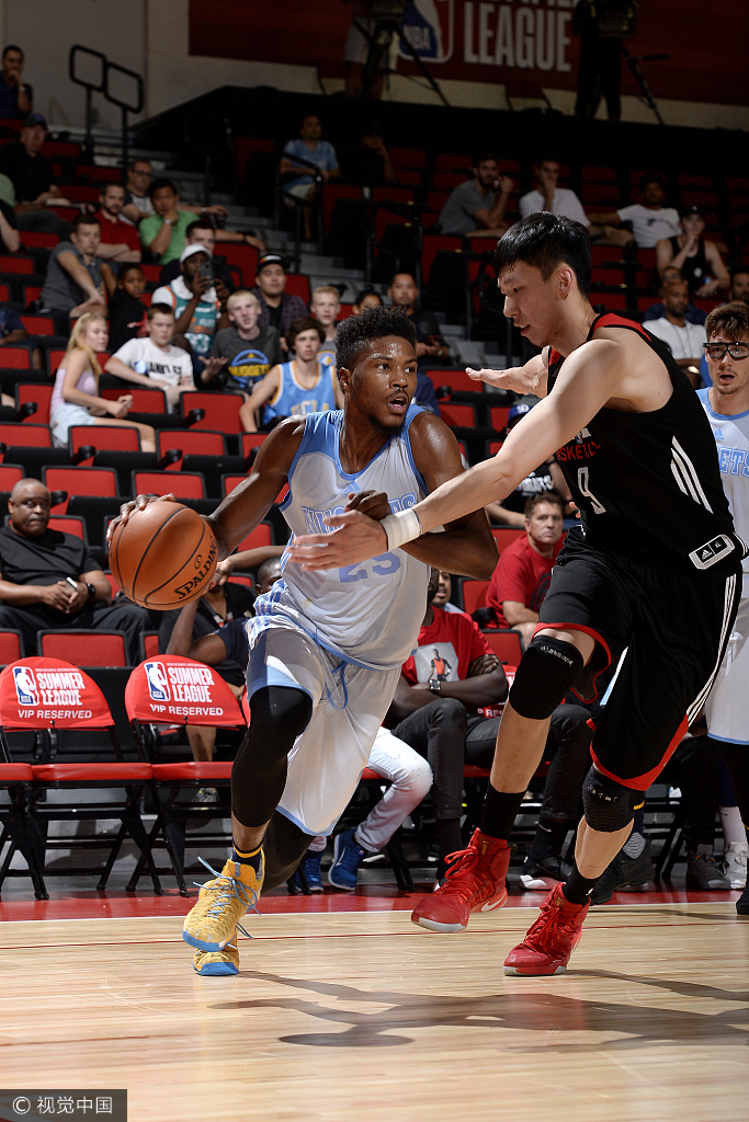 Malik Beasley #25 of the Denver Nuggets handles the ball during the game against Zhou Qi #9 of the Houston Rockets during the 2017 Las Vegas Summer League on July 7, 2017 at the Cox Pavilion in Las Vegas, Nevada. [Photo: NBAE via Getty Images/David Dow]