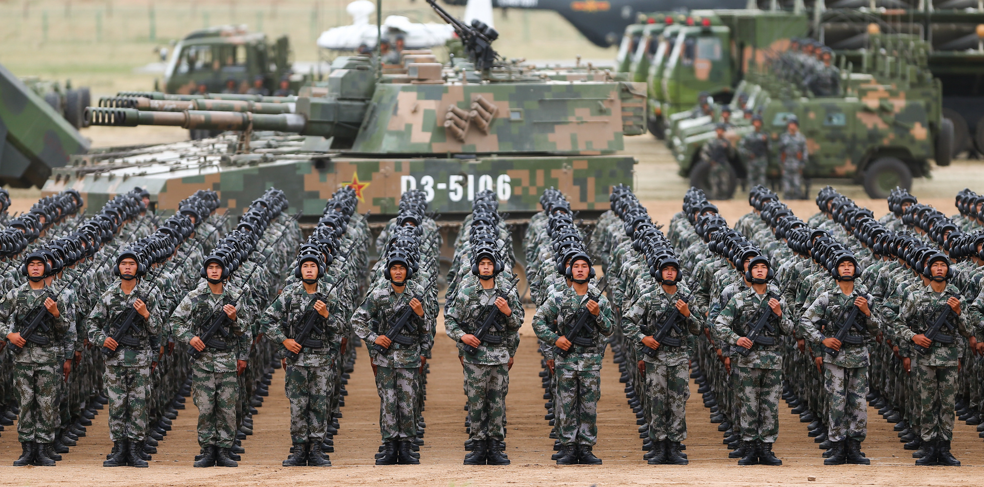 A grand military parade to mark the 90th birthday of the People's Liberation Army (PLA) is held in the Zhurihe military training base in north China's Inner Mongolia Autonomous Region on July 30, 2017. This is the first time that China commemorates the Army Day, which falls on August 1, with a military parade since the founding of the People's Republic of China in 1949. Chinese President Xi Jinping inspected the troops and delivered an important speech. 12,000 troops, more than 100 aircraft and 500 pieces of grand equipment rallied for the parade. [Photo: China Plus/Li Jin]
