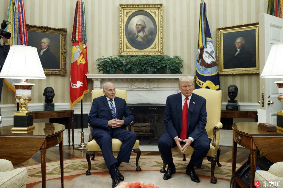 President Donald Trump meets with new White House Chief of Staff John Kelly after he was sworn in during a ceremony in the Oval Office with President Donald Trump, Monday, July 31, 2017, in Washington. [Photo: IC]