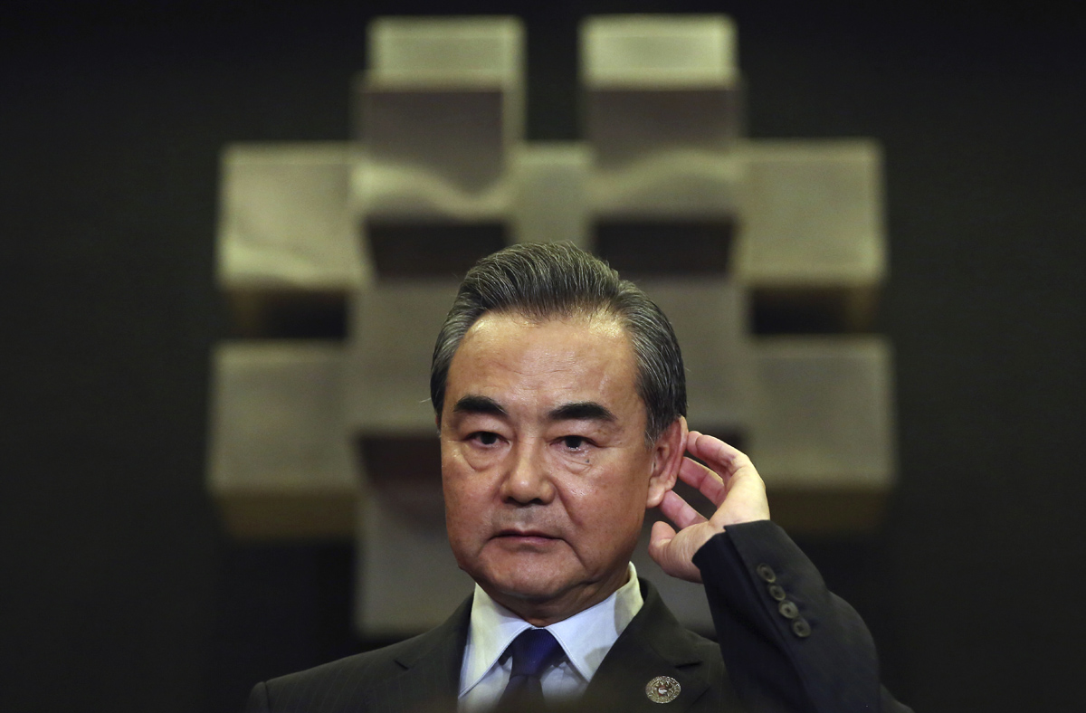 Chinese Foreign Minister Wang Yi gestures as he answers questions from reporters as he attends the 50th ASEAN Foreign Ministers' Meeting and its dialogue partners in Manila, Philippines, Sunday, Aug. 6, 2017. [Photo: AP/Aaron Favila]