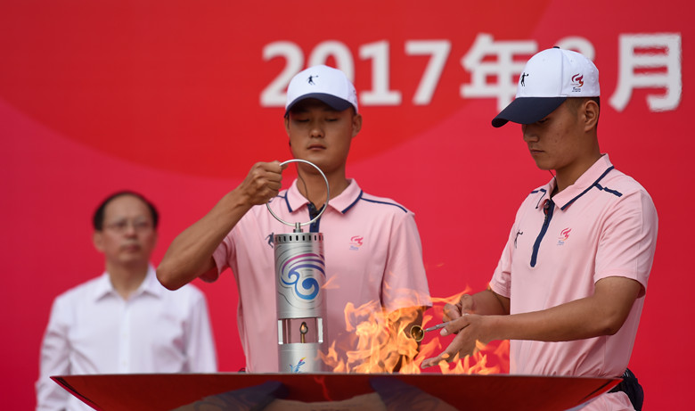 The torch relay for the 13th Chinese National Games begins in Tianjin's Minyuan Square on Tuesday, August 8, 2017, and will end at Tianjin Olympic Center Stadium on August 27. [Photo: Xinhua]