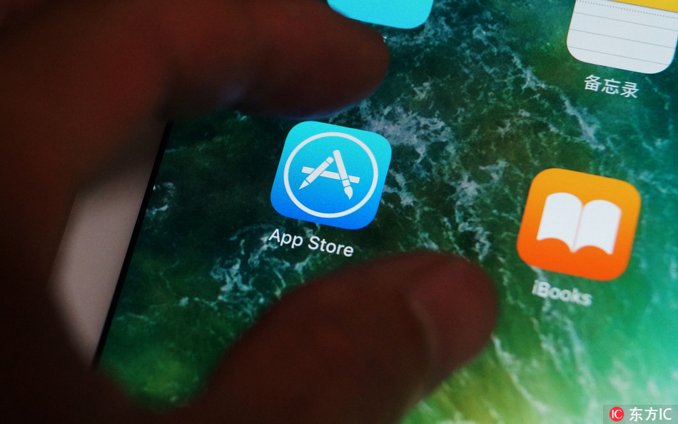 Apple reported as a monopoly to take apps off shelves. [Photo: IC]