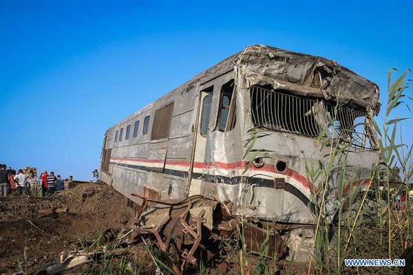 Photo taken on August 11, 2017 shows the train crash site in Alexandria province, Egypt. At least 49 people were killed and more than 130 others were injured Friday in a crash between two trains in Egypt's Alexandria province, Egypt's Health Ministry said. [Photo: Xinhua/Asmaa Abdelatif]