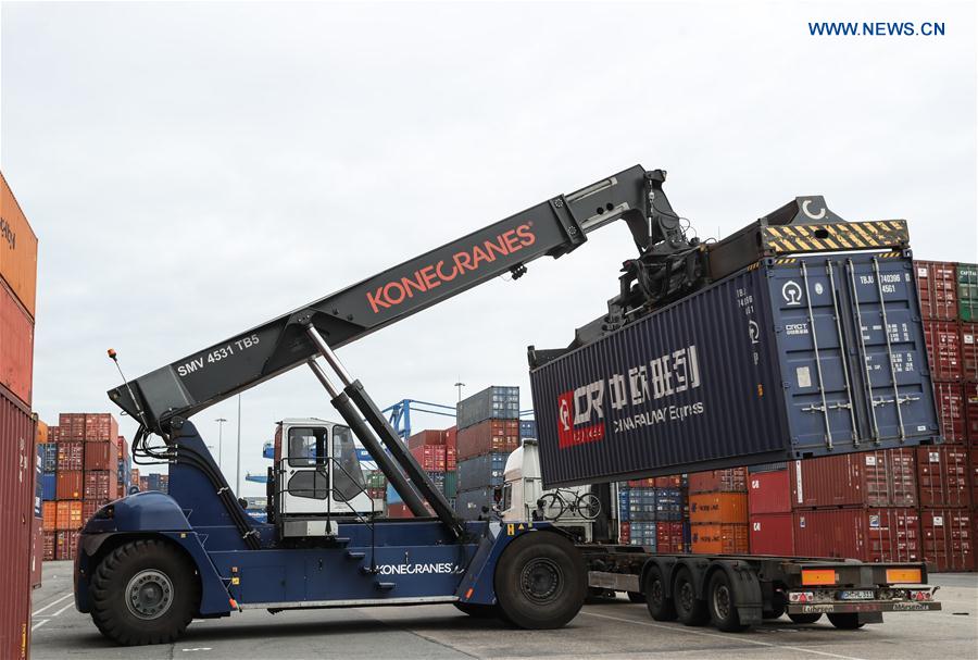 Photo taken on April 11, 2017 shows a cargo of China Railway Express being moved at Duisburg Intermodal Terminal (DIT) in Duisburg, western Germany. Since "YUXIN'OU" (Chongqing-Xinjiang-Europe) railway line came into use in 2011, China-Europe freight train services, with a growing number of trans-continental railway lines and increasing cargo volume, have become important to the ancient Silk Road. [Photo: Xinhua]